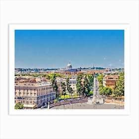 Rooftops and Domes in Rome. This image depicts a picturesque view of a historic cityscape, characterized by its terracotta rooftops and prominent domed structures. The two large domes, likely belonging to significant religious or historical buildings, stand out against a clear blue sky. The foreground is filled with a variety of buildings, showcasing a mix of architectural styles and colors, while lush green trees add a touch of nature to the urban scene. 1 Art Print