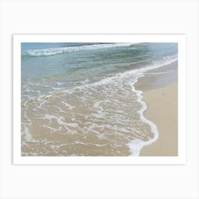 Sea water, waves and beige sand on the beach Art Print