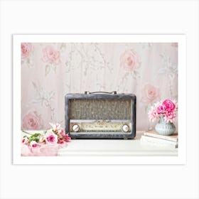 Antique Portable Radio Adorned With Flowers Radiating A Soft Pink And Grey Palette Enveloped In A Art Print