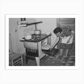 Spanish American Woman Removing Baked Bread From Oven Farm Near Taos, New Mexico By Russell Lee Art Print