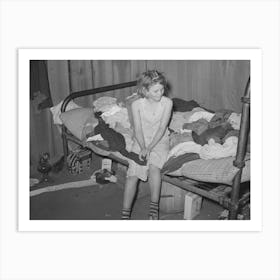 Young Migrant Girl Sitting On The Corner Of Bed In Camp House Near Muskogee, Oklahoma, Muskogee County By Russ Art Print