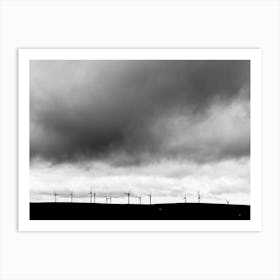 Cloudy sky over wind farm Art Print Art Print