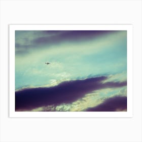 Silhouette Of An Airplane Flying In Sunset Sky Art Print