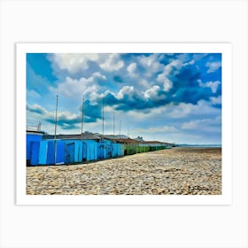 Coastal Serenity in Viareggio. A tranquil view of Viareggio's beach area, featuring iconic seaside structures and vibrant beach cabins, under a dramatic sky. The soft pastel tones of the scene reflect the relaxed charm of Versilia's coastline. 1 Art Print