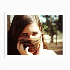 Woman Hiding Her Face With Her Hair Looking At Camera Art Print