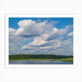 Cloudy Sky Over A Lake Art Print