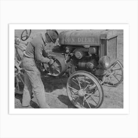 Son Of Pioneer At El Indio, Texas, Repairing Clutch On Tractor By Russell Lee Art Print