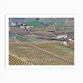 Langhe Rolling Vineyards in Early Spring. Langhe, Italy. An aerial view of beautifully contoured vineyards, showcasing rows of neatly planted vines stretching across rolling hills. The alternating shades of green and earthy tones create a mesmerizing pattern, highlighting the precision and artistry of vineyard cultivation. This serene landscape captures the essence of rural life in a wine-producing region. 4 Art Print