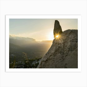 Golden sunlight and rocks at sunset Art Print