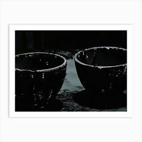 Two Black Cups On A Table Art Print