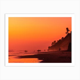 Surfers On The Beach During Evening Warmth Art Print