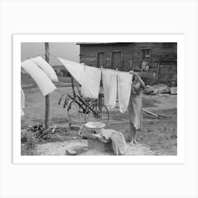 Daughter Of Tenant Farmer Hanging Up Clothes Near Warner, Oklahoma By Russell Lee 1 Art Print