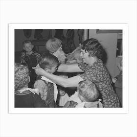 Wpa (Work Projects Administration) Teacher At The Nursery School Puts On Bibs Of Her Charges At The Fsa Art Print