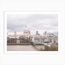 London, England I Skyline view of Saint Paul's Cathedral Millennium Bridge over River Thames from the Tate Modern museum for a grey urban landscape panorama photography in the Londoner rain Art Print