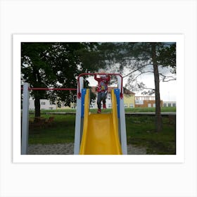 Child On A Playground Slide Art Print