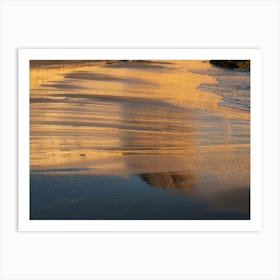 Reflection of the evening light in wet sand Art Print