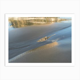Reflections on the sandy beach Art Print