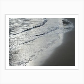 Silver-grey reflections on the sandy beach Art Print