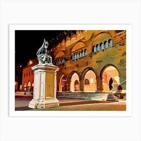 Nighttime Statue and Arcades in Rimini citycenter. The image depicts a statue of a seated figure, possibly a historical figure or a religious icon, standing on a pedestal in a public square. The statue is made of bronze or a similar material and is illuminated by the soft glow of streetlights. The statue is positioned in front of a grand building with a series of arched doorways, creating a sense of depth and grandeur. Art Print