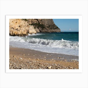 Waves and cliffs on the beach Art Print