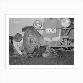 Migrant Steeple Jack Removing The Crank Case From His Automobile While His Father Blocks Up The Front Wheel, Near Pragu Art Print