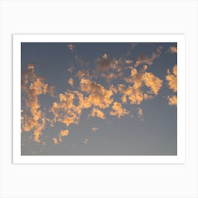 Scenic sunset clouds in pale blue sky 2 Art Print