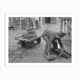 Miner Picking Up Drilling Equipment To Put On Truck, Mogollon, New Mexico By Russell Lee Art Print
