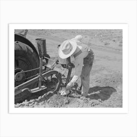 Day Laborer Removing Clod Of Dirt From Plow Points On Tractor On Large Farm Near Ralls, Texas By Russell Lee Art Print
