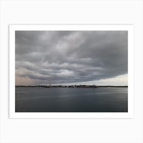Storm Clouds Over The Water Art Print
