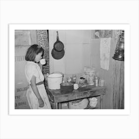 Mexican Girl Drinking A Cup Of Water In The Kitchen Of Her Home In San Antonio, Texas By Russell Lee Art Print