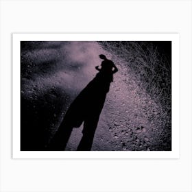 Elongated Shadow Of A Man On Gravel Art Print