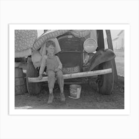 Son Of Migrant Sitting On Bumper Of Their Truck, Weslaco, Texas, Notice New Mexico License By Russell Lee Art Print