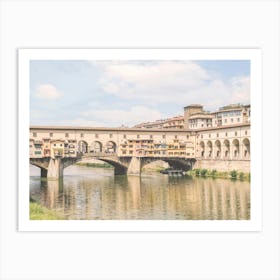 Florence, Italy I Pastel Ponte Vecchio on the Arno to experience dolce vita in Tuscany in sunny to retro vintage atmosphere photography with an Italian summer yellow sunny aesthetic like an old Mediterranean village Art Print