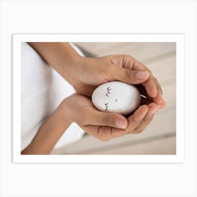 Child Holding An Egg Art Print