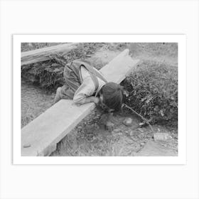 Spanish American Boy Playing In Irrigation Ditch, Chamisal, New Mexico By Russell Lee Art Print