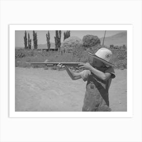 Mormon Farm Boy Shooting Air Rifle, Box Elder County, Utah By Russell Lee Art Print