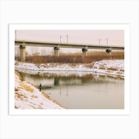 Snowy Bridge Over A River Art Print