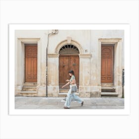 Woman Walking In The Streets Of Lecce In Italy Art Print