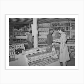 Clerk In General Store Dusting, Pie Town, New Mexico By Russell Lee Art Print