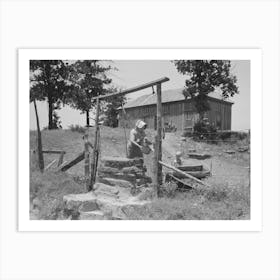 Tenant Farmer Drawing Water At Well, This Woman (Her Husband Died Several Months Ago) And Her Three Grown Son Art Print