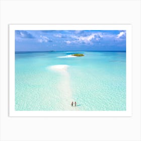 Two People Walking On A Beach Art Print