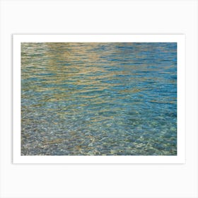 Clear sea water and reflections on the beach Art Print