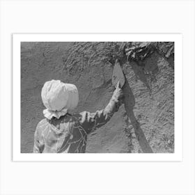 Spanish American Woman Plastering Adobe House, Chamisal, New Mexico By Russell Lee Art Print