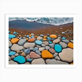 Some Rocks Near The Water And Some Sand Art Print