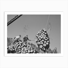 Loaders Pushing Logs Into Place While Loading Car, Lumbercamp Near Effie, Minnesota By Russell Lee Art Print