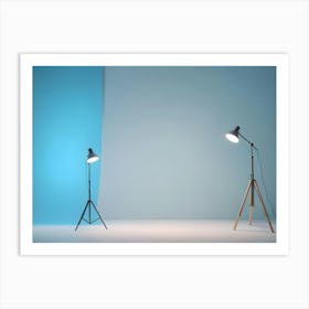 Photo Of Two Lamps With Light Shining On A Blue Backdrop In A White Room Art Print