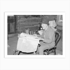 William Besson, Iron Ore Prospector, Examining Geological Survey Maps In His Cabin Near Winton, Minnesota By Russ Art Print