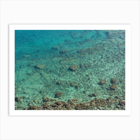 Clear water in a rocky Mediterranean bay Art Print