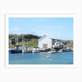 A white boathouse en some fishing ships in a small harbour at Ølberg in Norway - summer nature and travel photography by Christa Stroo Art Print