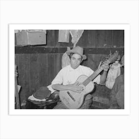 Mexican Boy Playing Guitar In Room Of Corral, Robstown, Texas By Russell Lee Art Print